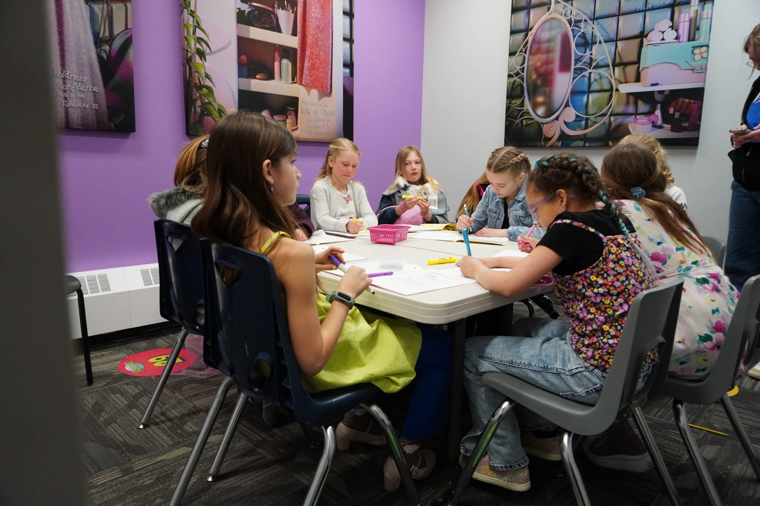 DSC02953-scaled a child is drawing on a piece of paper